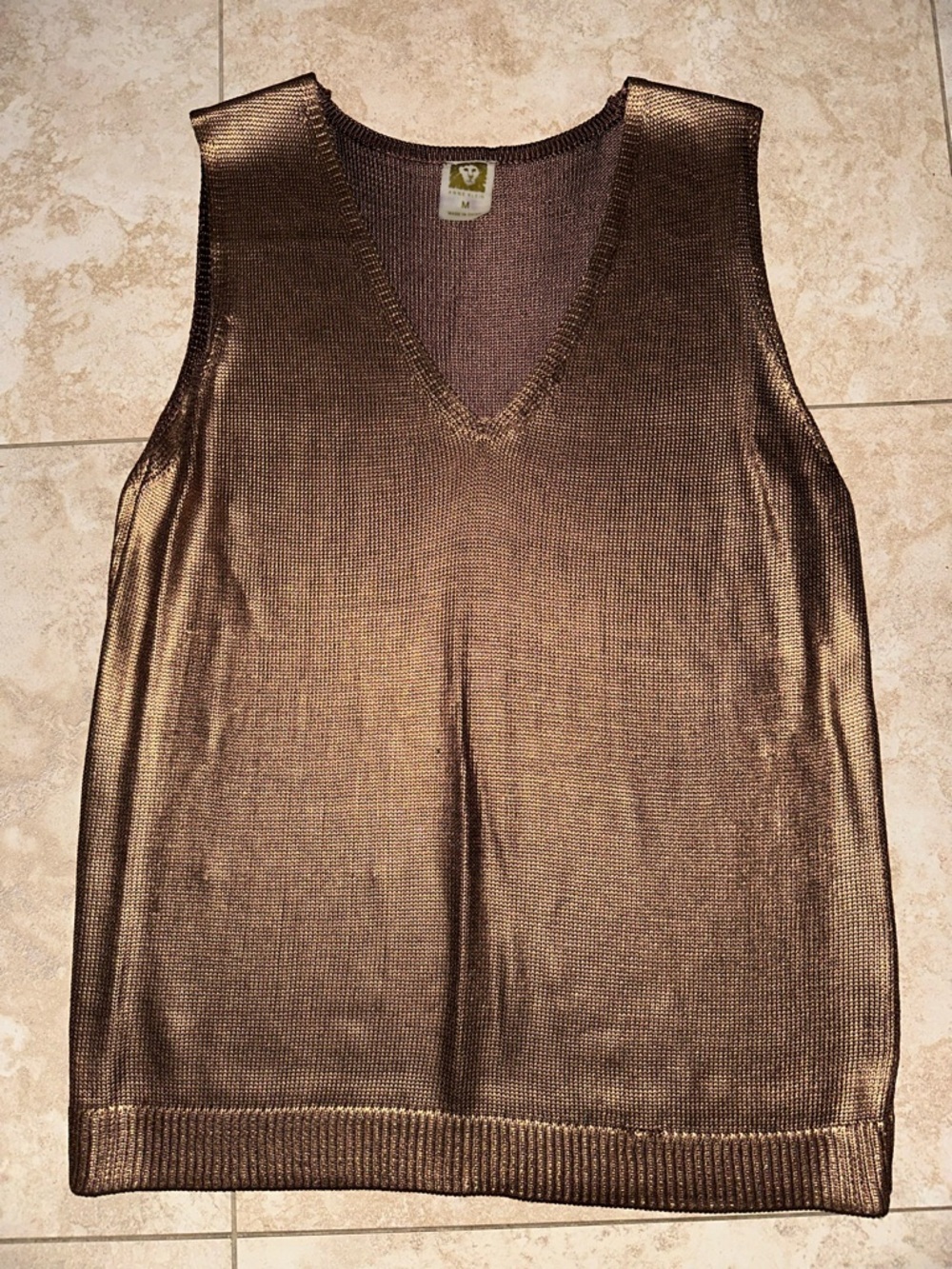 Metallic tank
